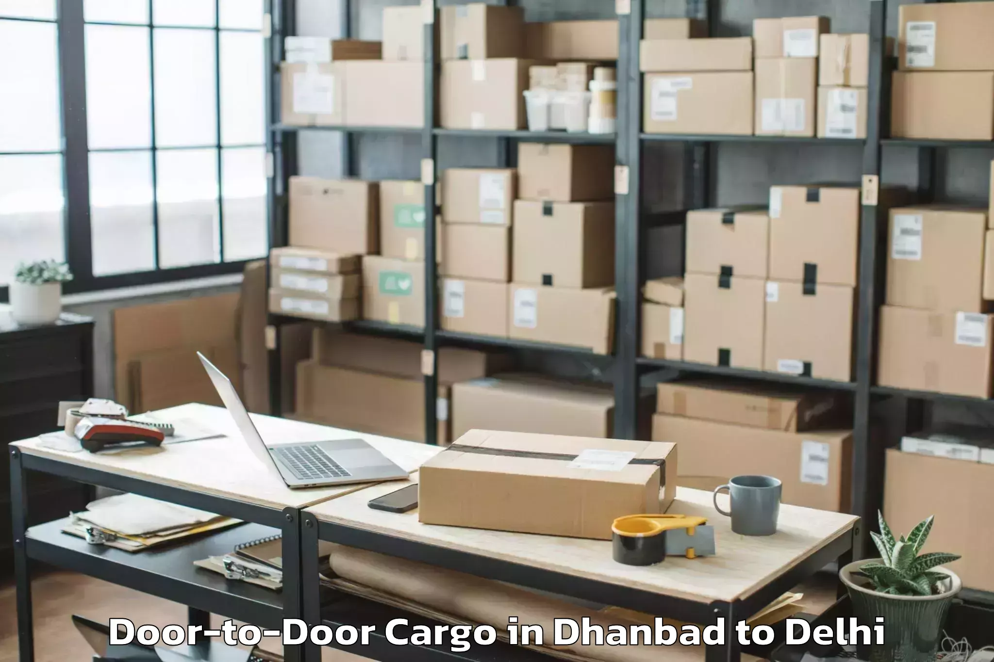 Quality Dhanbad to Naraina Door To Door Cargo